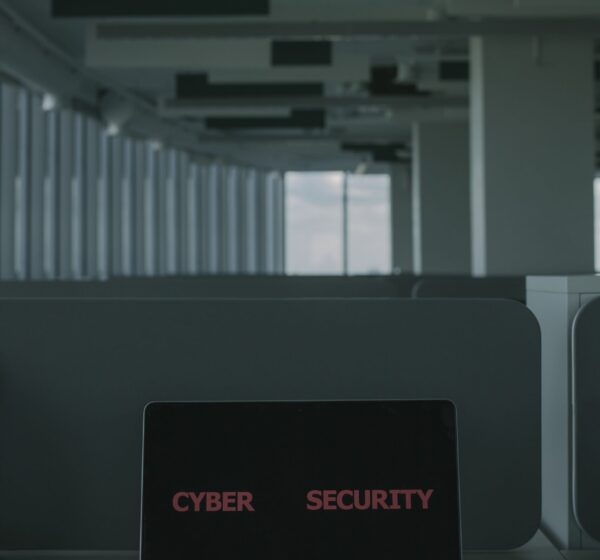 Free Laptop With Cyber Security Text on the Screen Stock Photo